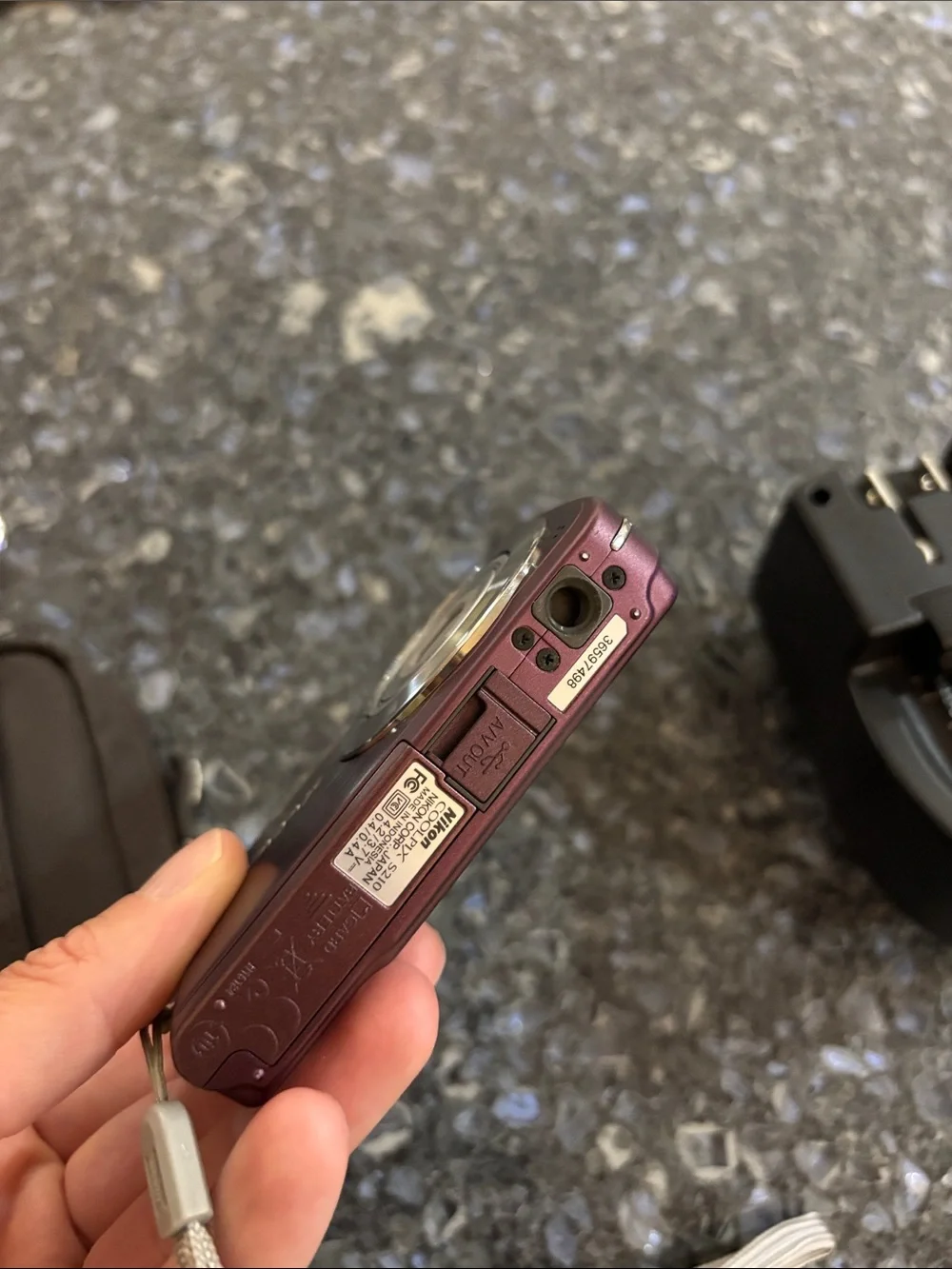 Nikon COOLPIX Compact Digital Camera - Burgundy with Wrist Strap and Memory Card